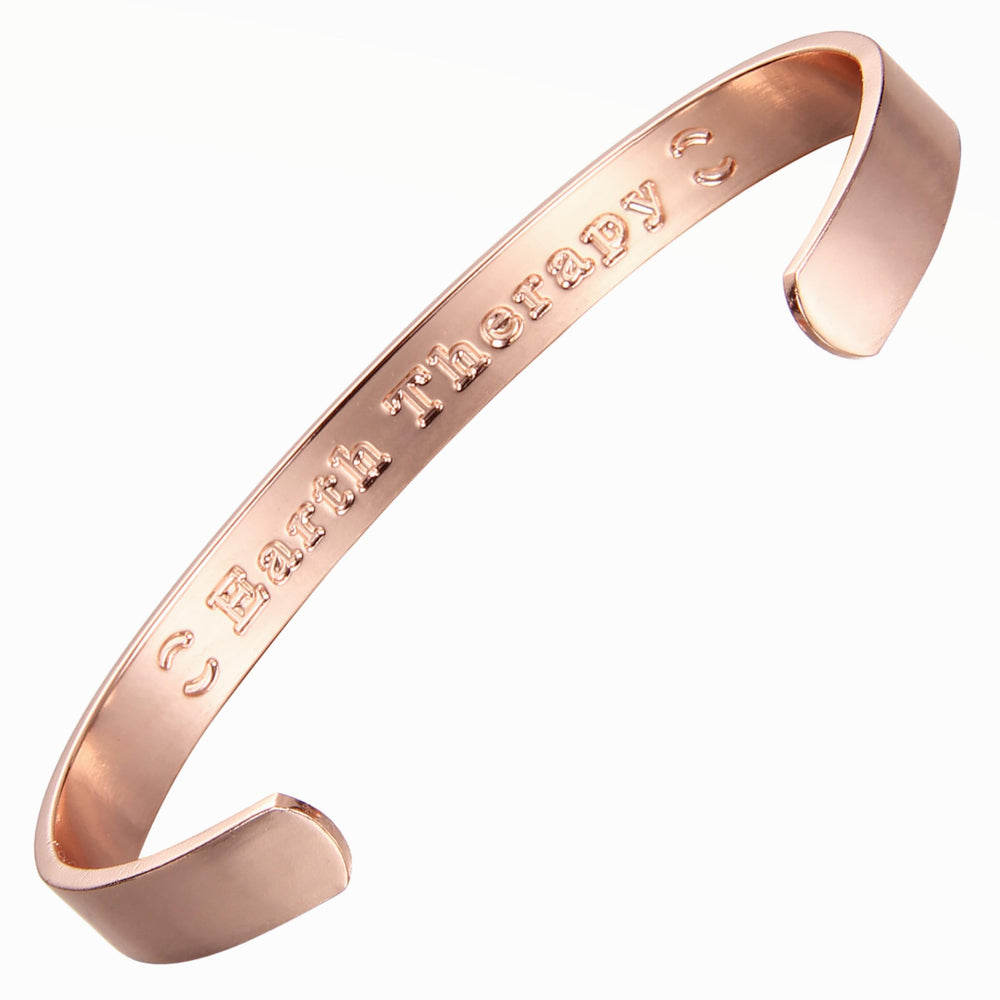 Earth Therapy unisex copper bracelet on wrist with adjustable fit for comfort