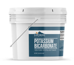 Close-up of Earthborn Elements Potassium Bicarbonate powder showing fine white granules for culinary use.