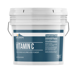 Earthborn Elements Vitamin C powder in a resealable bucket shows purity and convenience.