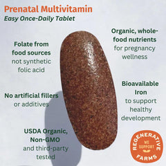 Closeup of EarthFirst Organic Prenatal tablet, smooth coating for easy swallowing.
