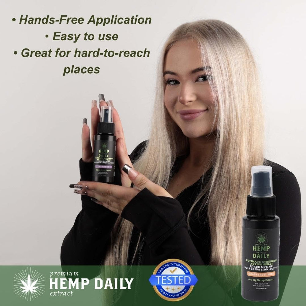 Hands applying Earthly Body Hemp Daily Active Spray with a fine mist