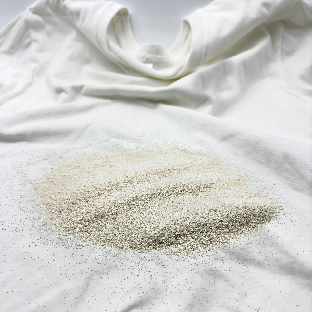 EastChem Cellulase 2000 close-up shows granular texture for washing.
