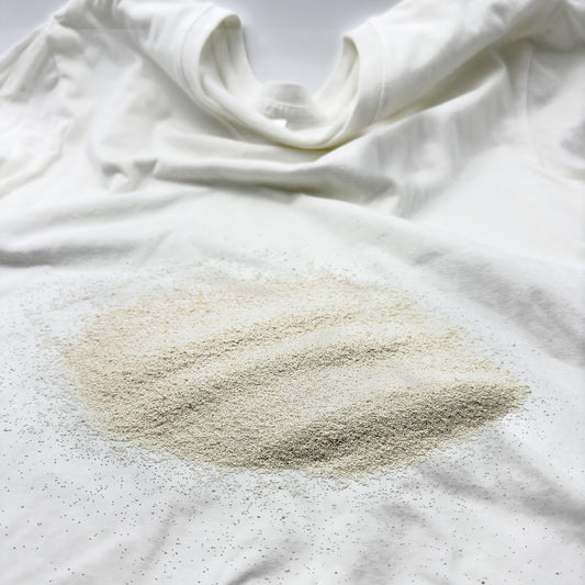 EastChem Cellulase 2000 close-up shows granular texture for washing.
