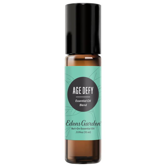 Edens Garden Age Defy roll-on bottle close-up showing convenient, pre-diluted aromatherapy blend.