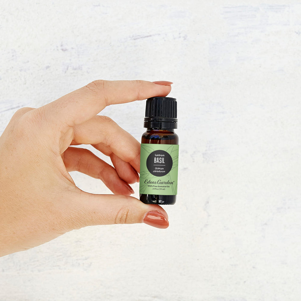Edens Garden Basil-Lemon essential oil in diffuser setup—refreshing aroma.