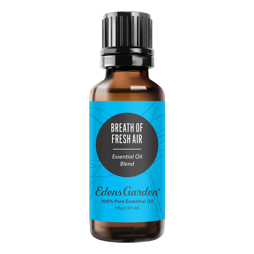 Edens Garden Breath of Fresh Air bottle showcasing citrusy essential oil blend for refreshing spaces.