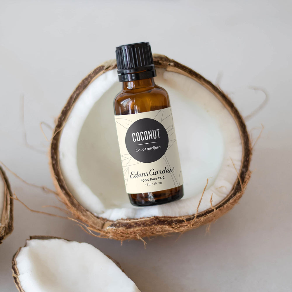 Edens Garden Coconut CO2 Essential Oil bottle, close-up of amber container for premium quality.