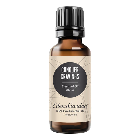 Edens Garden Conquer Cravings bottle front shows a pure essential oil blend for mindful moments