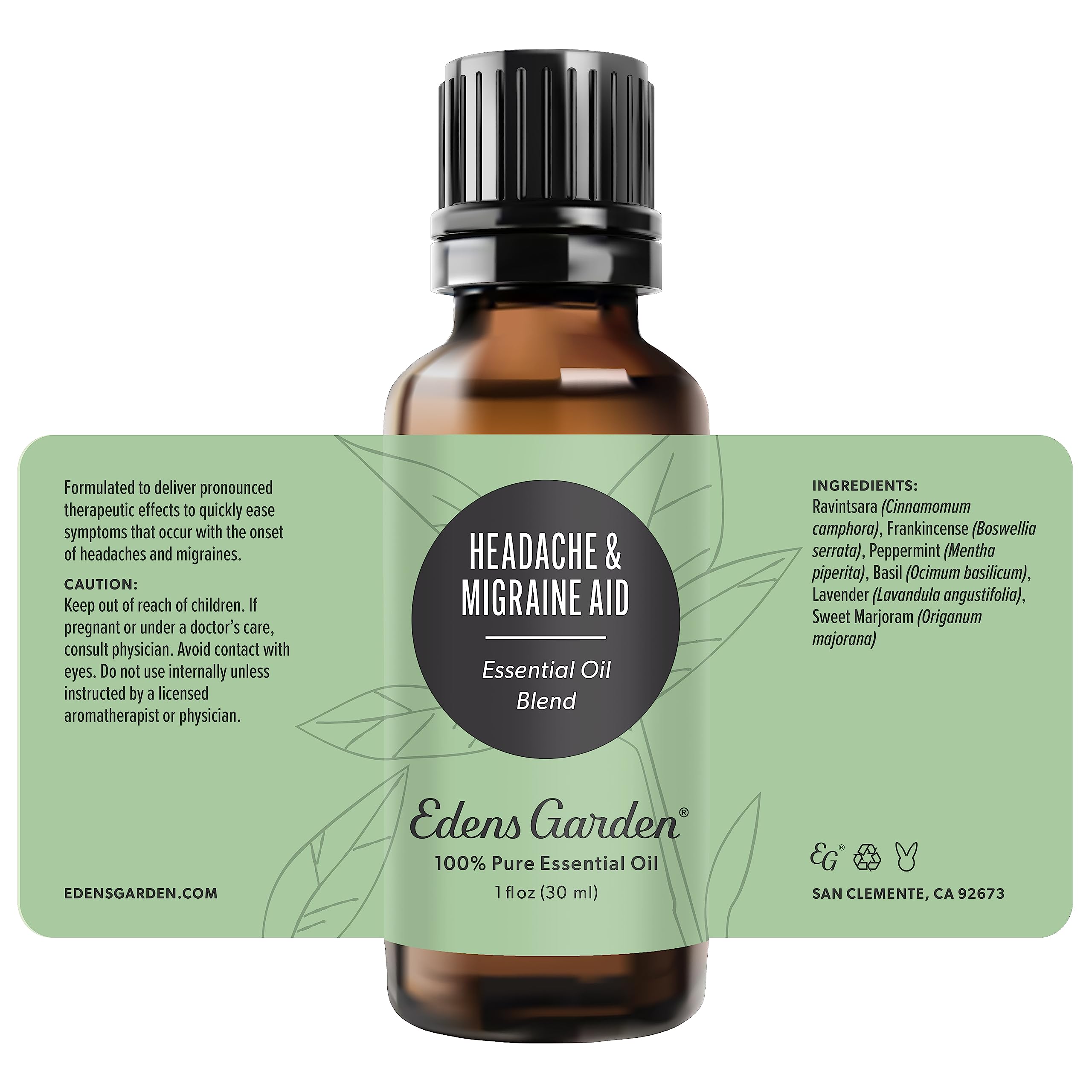 Edens Garden Headache and Migraine Aid bottle diffusing on a desk for refreshed mood.