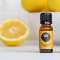 Edens Garden Lemon oil diffuser scene with drops ready to refresh your space.