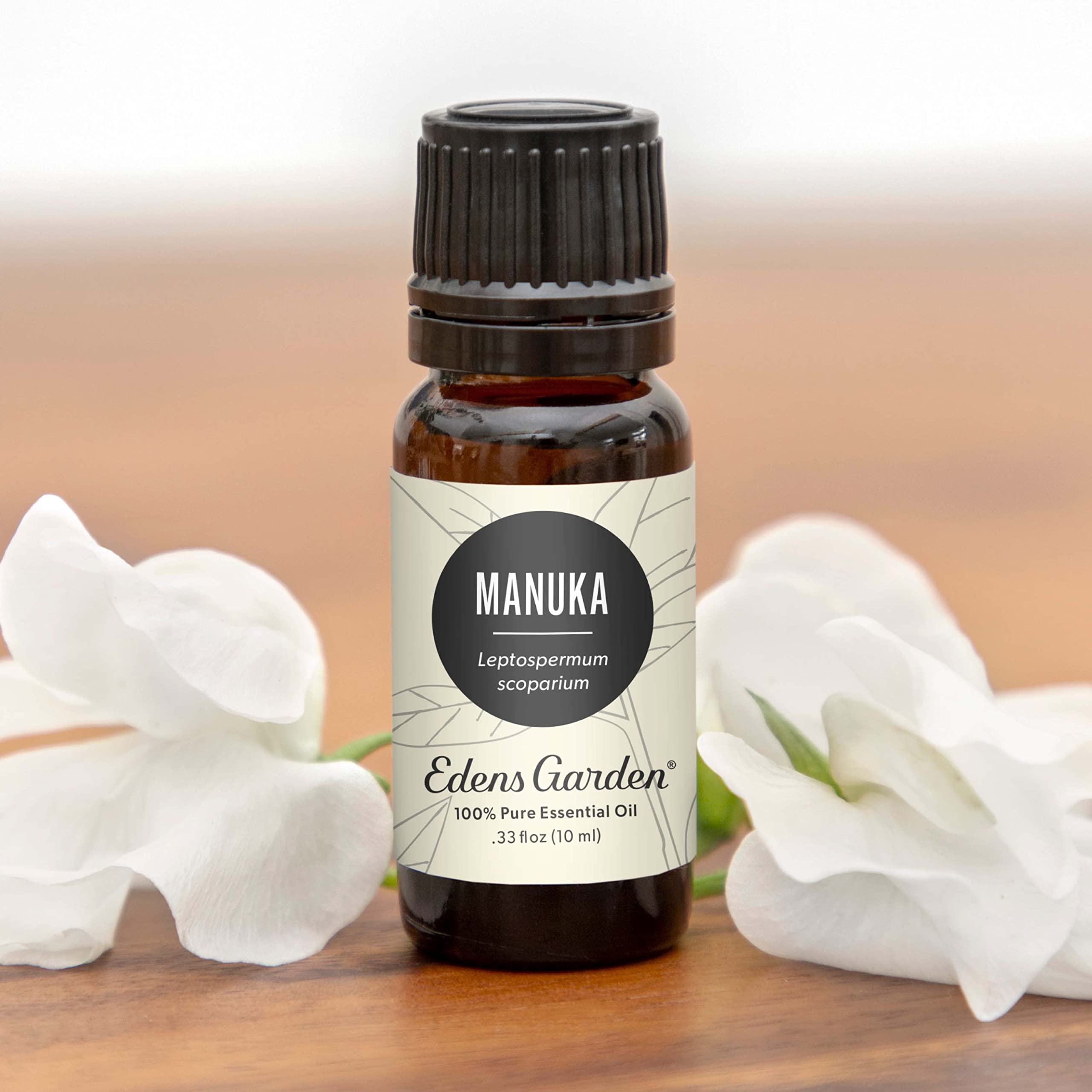 Edens Garden Manuka oil dropper close-up for precise topical application.