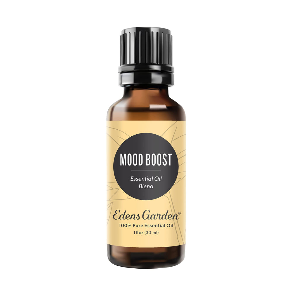 Edens Garden Mood Boost bottle pour with a vibrant, uplifting citrus aroma.