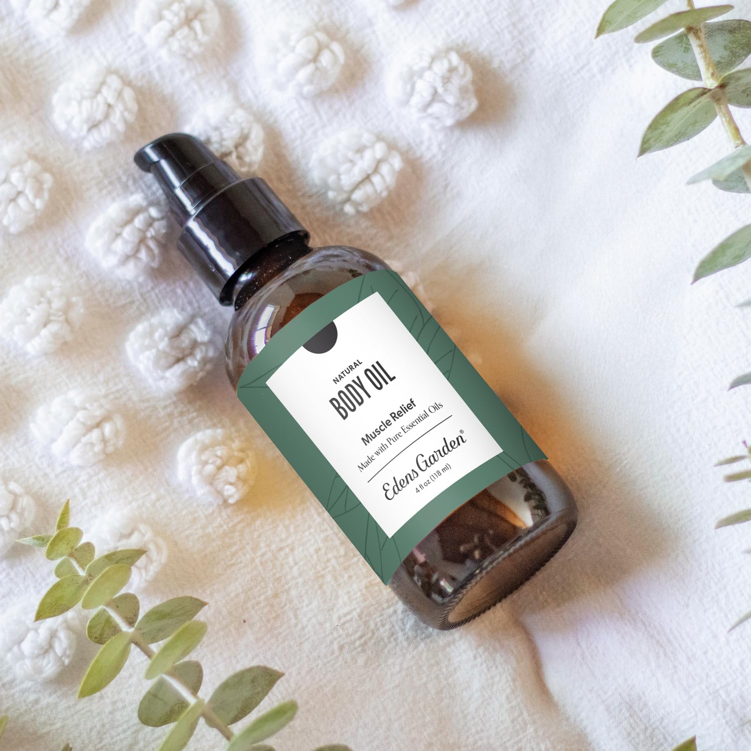 Edens Garden Muscle Relief bottle label highlights peppermint and wintergreen notes for aroma and mood.
