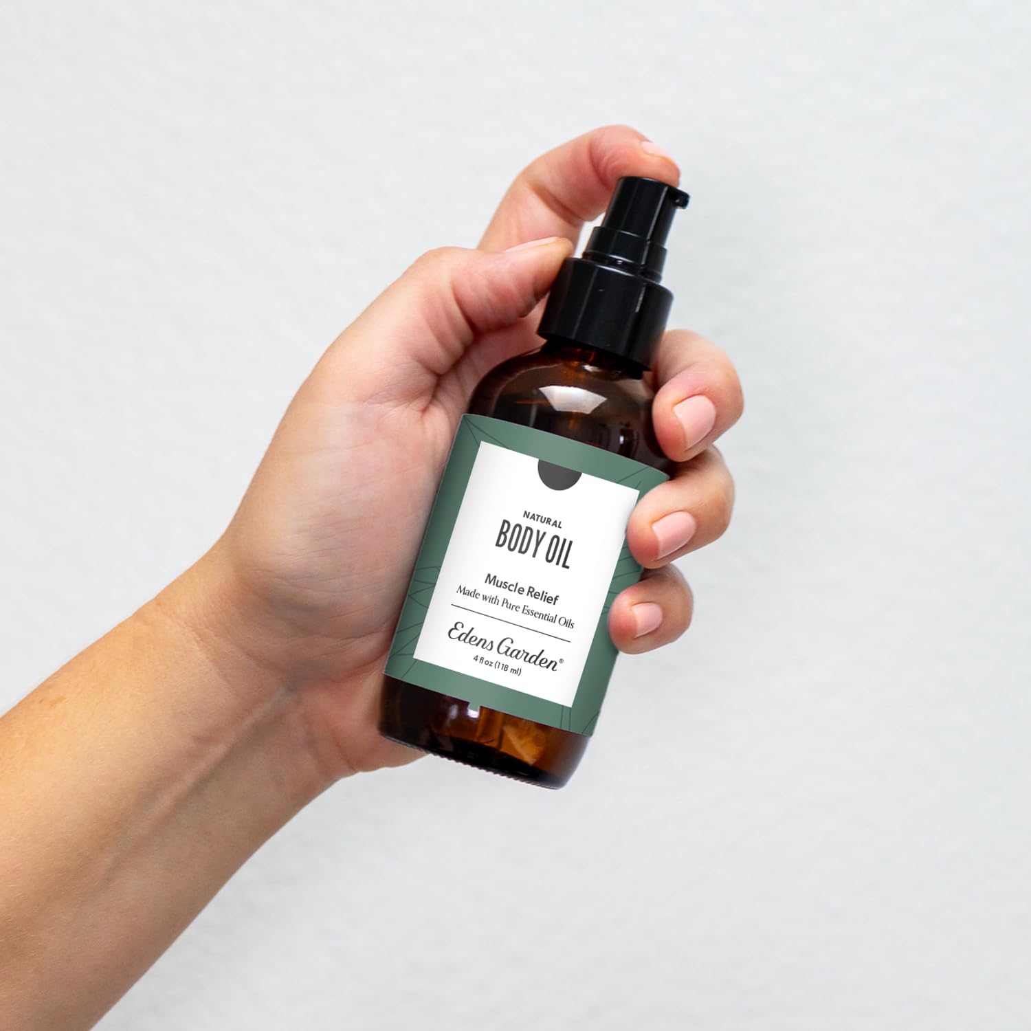 Edens Garden Muscle Relief massage-application demonstrates targeted relief during a relaxing self-care session.
