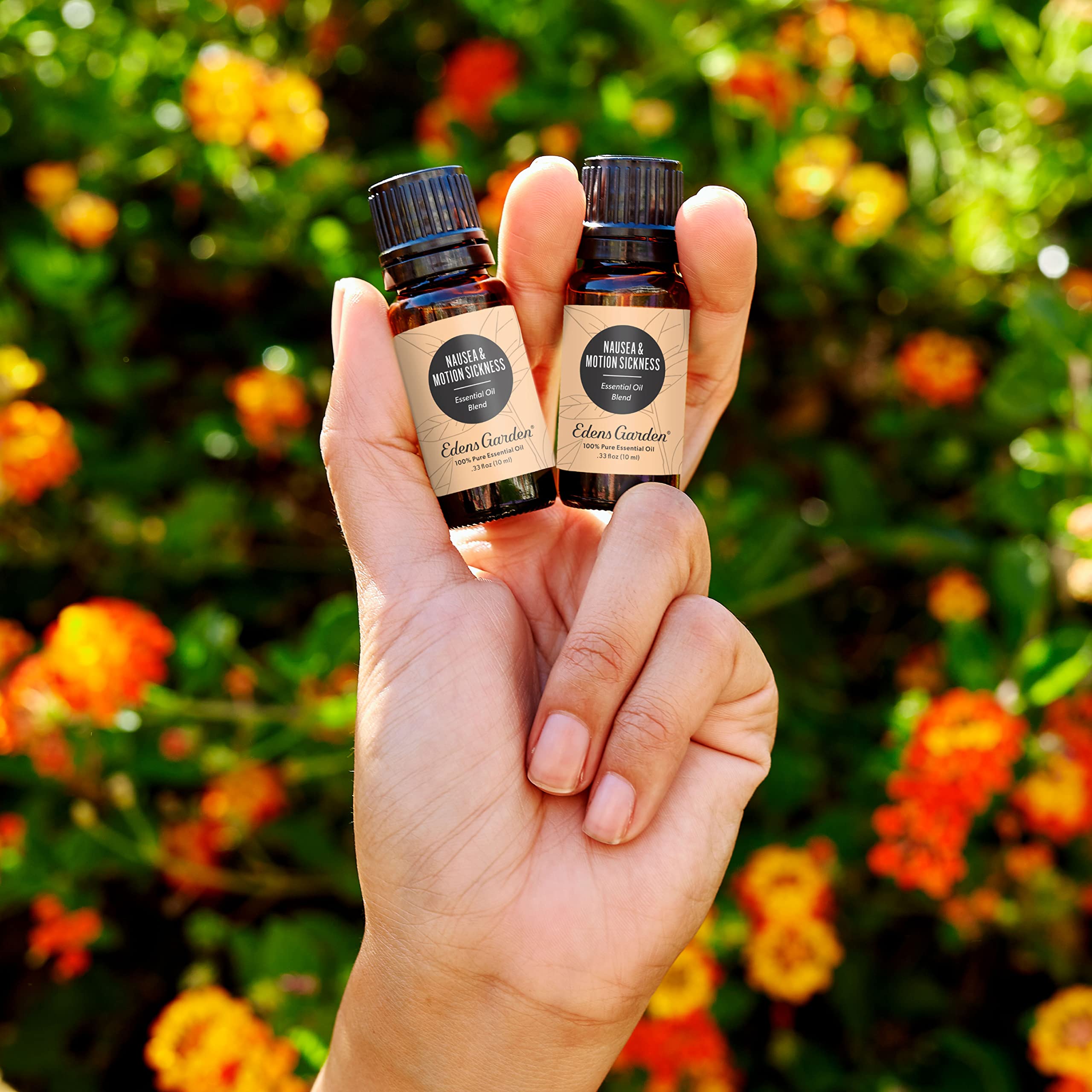 Edens Garden blend label shows Lemon, Ginger, Peppermint notes for uplifting scent.