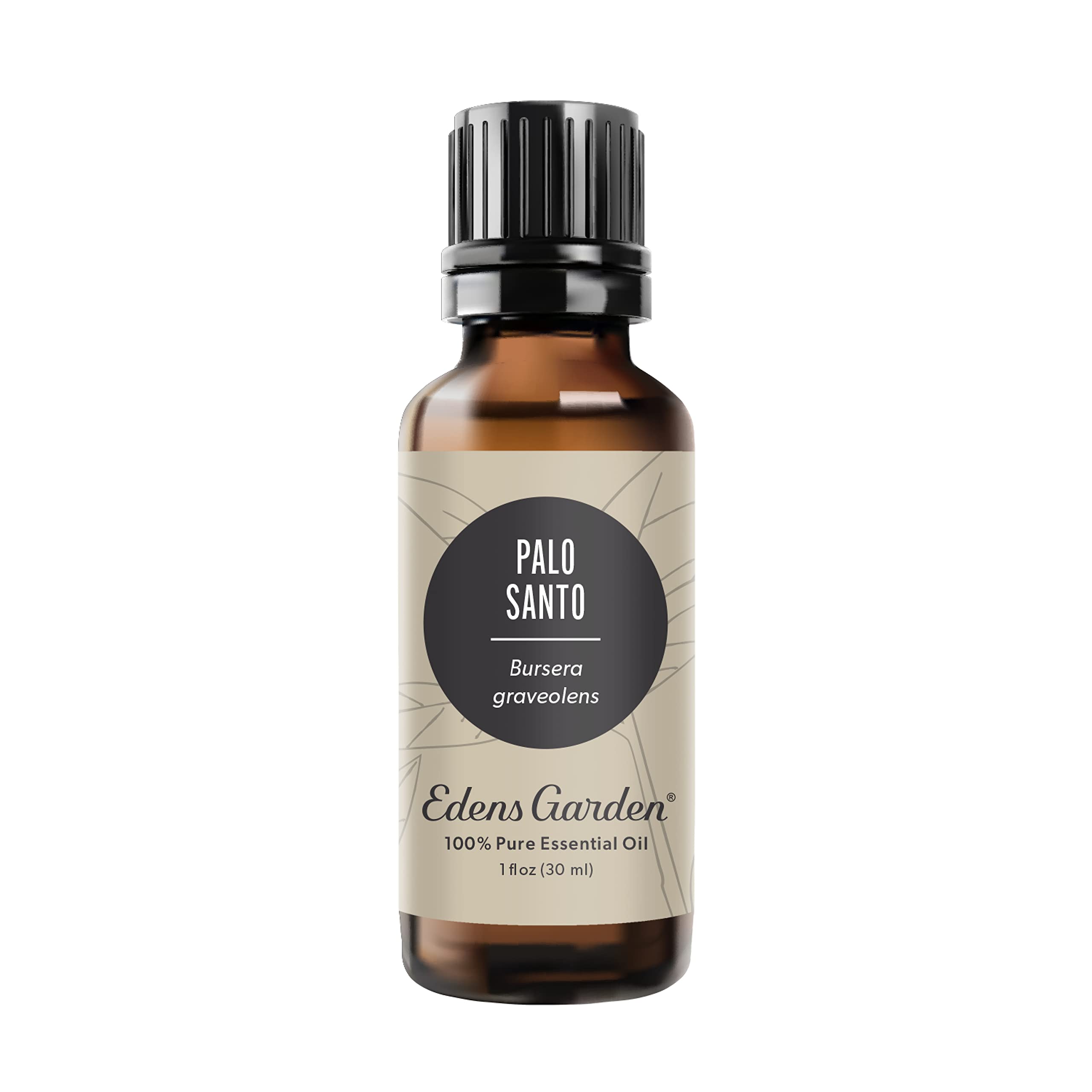 Edens Garden Palo Santo essential oil bottle close-up for calming aromatherapy.