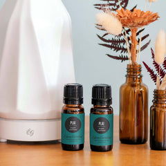 Plai essential oil in a diffuser setup highlighting earthier, soothing aroma.