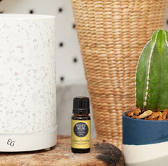 Edens Garden pure oil bottle closeup showing quality and clarity for diffusers.
