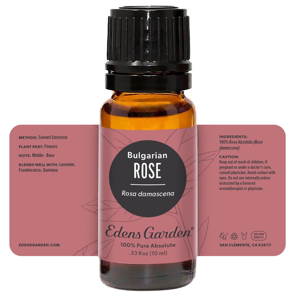 Edens Garden Rose Bulgarian Absolute lifestyle scene with diffuser and candles.