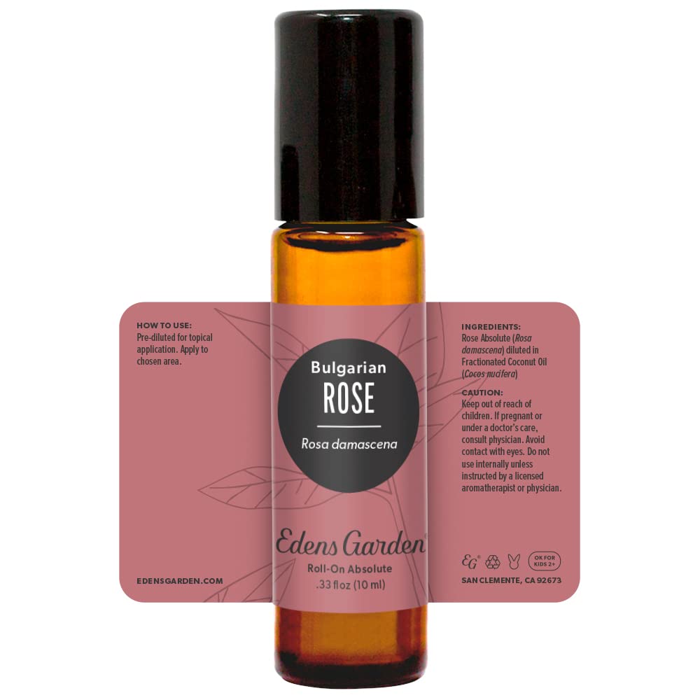 Edens Garden Rose Bulgarian Absolute Roll-On applied to skin for daily self-care