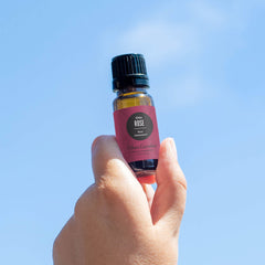 Edens Garden Rose-Otto bottle close-up highlighting premium oil