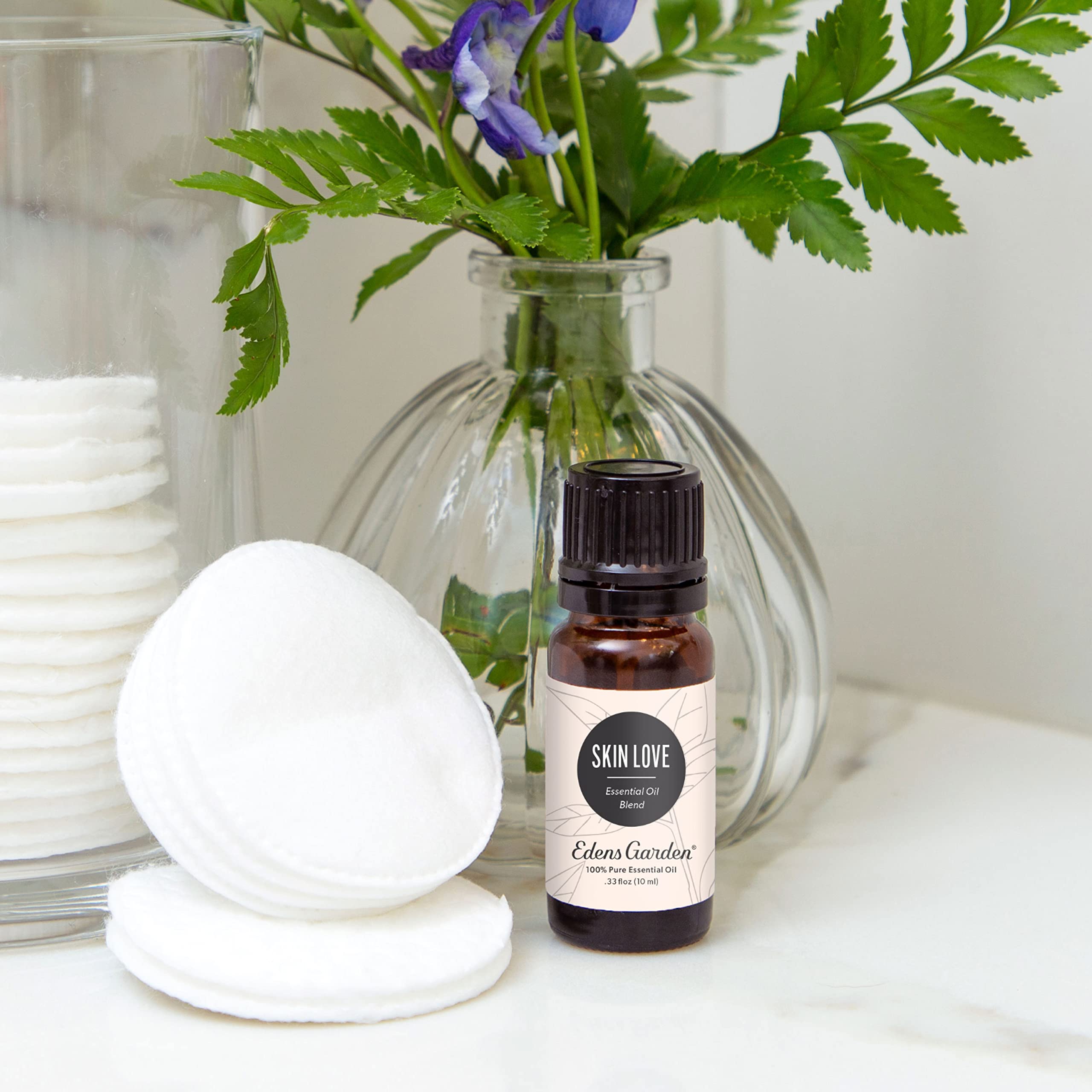 Edens Garden Skin Love closeup highlights premium, undiluted essential oils.