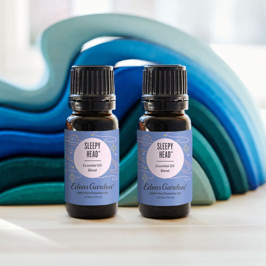 Sleepy Head bottle close-up shows pure essential oils for tranquil evenings.