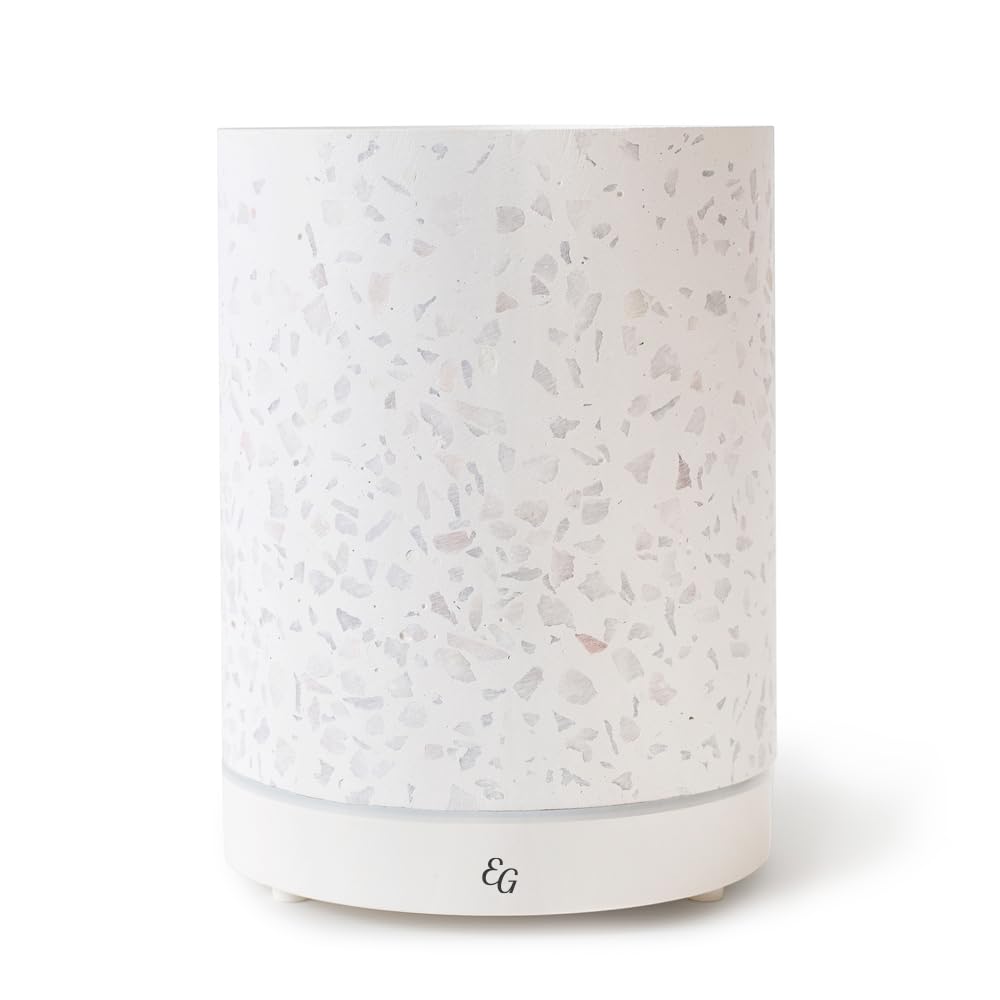 Edens Garden Terrazzo Diffuser front view with a gentle mist for room ambiance.