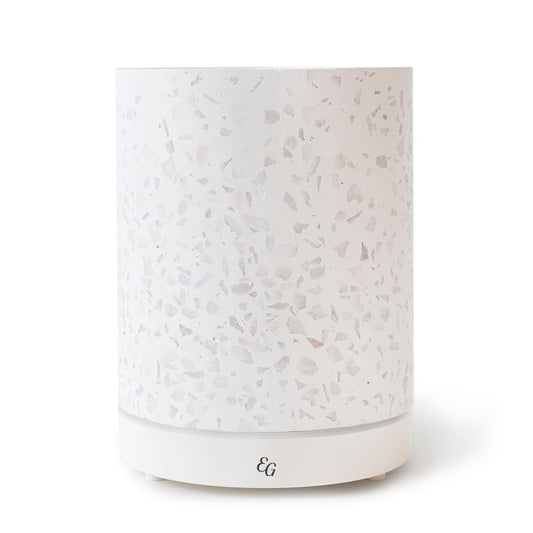 Edens Garden Terrazzo Diffuser front view with a gentle mist for room ambiance.