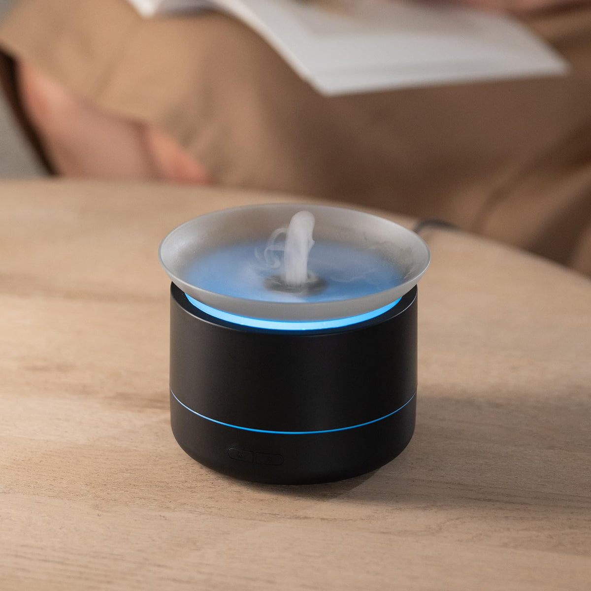 Eiifiter 200ml tabletop fountain with atomizing mist for calming desk ambiance.