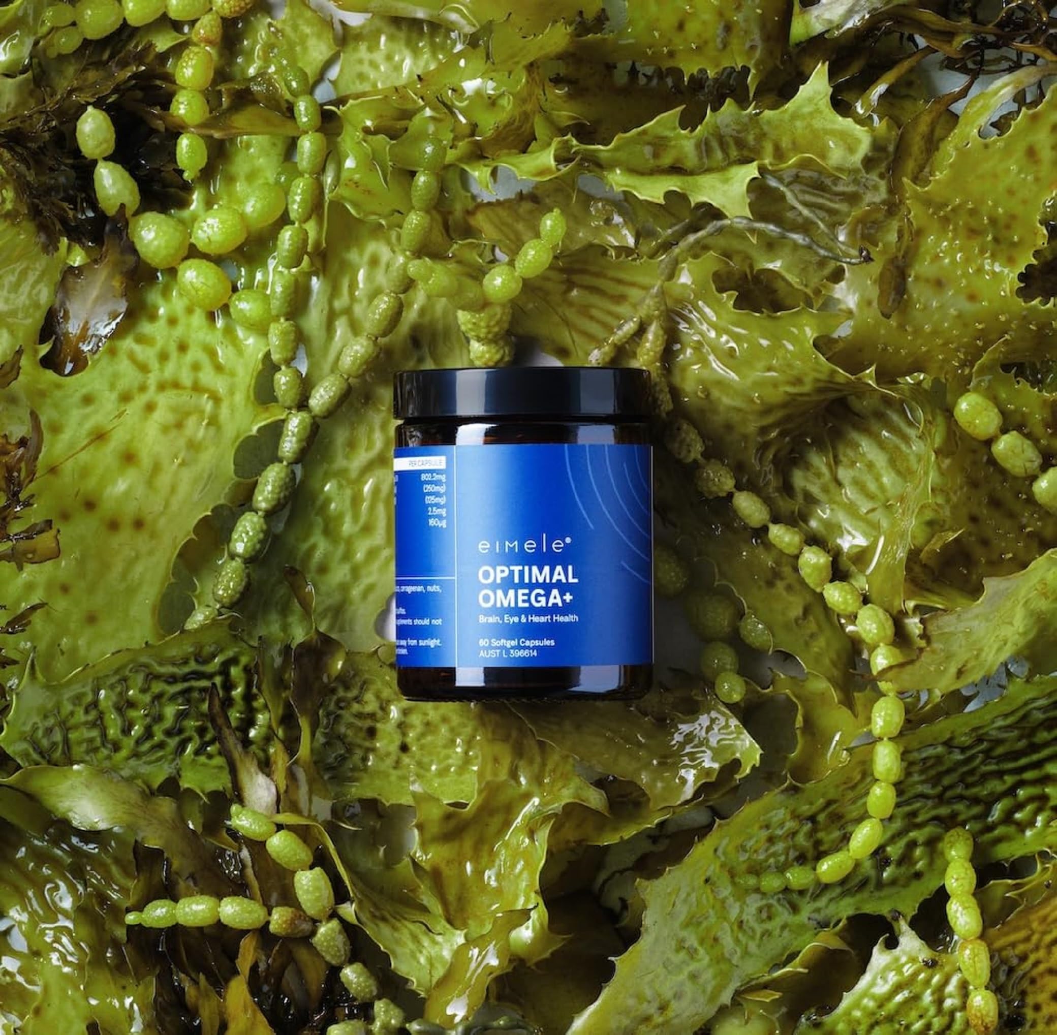 eimele Optimal Omega+ daily-use scene with water and capsules for wellness.
