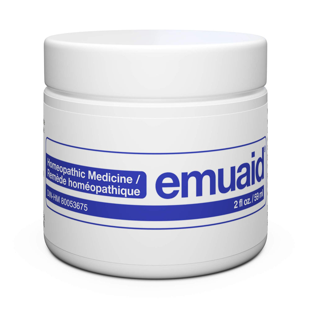 Emuaid Ointment jar on skin for soothing moisture and nourishment.