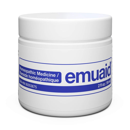 Emuaid Ointment jar on skin for soothing moisture and nourishment.