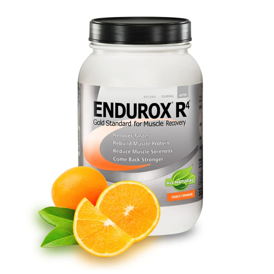 Endurox R4 Tangy Orange powder in tub ready to mix for post-workout recovery.