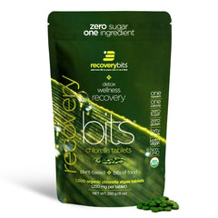 ENERGYBITS RECOVERYbits tablets closeup, green tablets for daily recovery support.