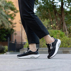 Ephiza walking shoes, side view highlighting arch support and cushioning.