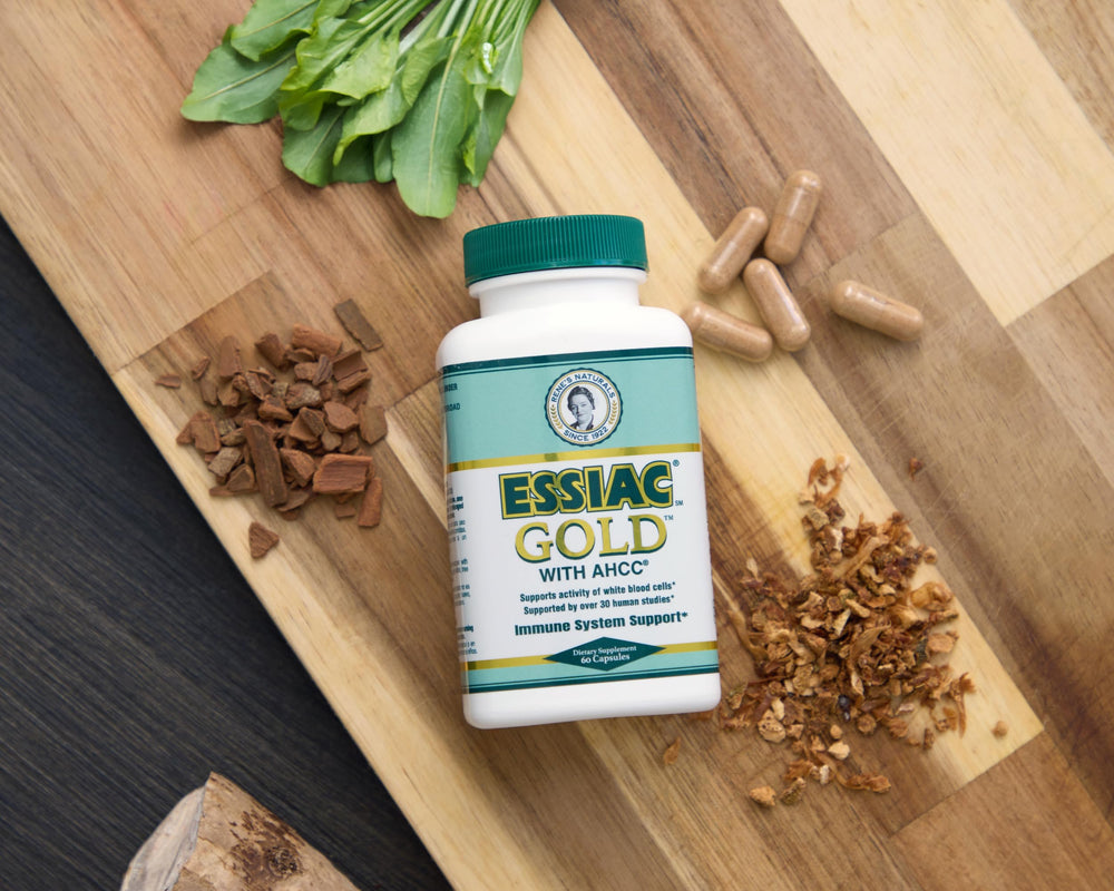 Essiac Gold packaging open to reveal inner materials and labeling.