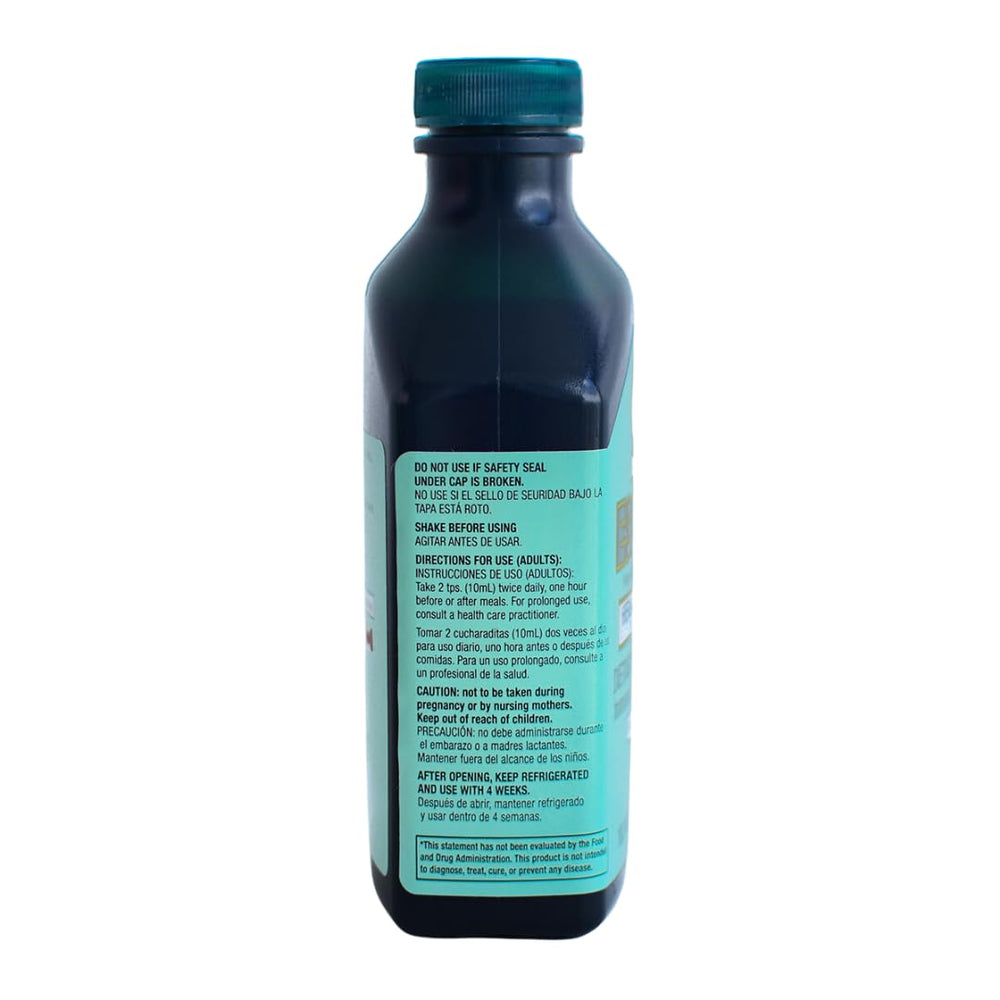 Pouring Essiac Original Herbal Liquid Extract for easy dosing in a morning routine.