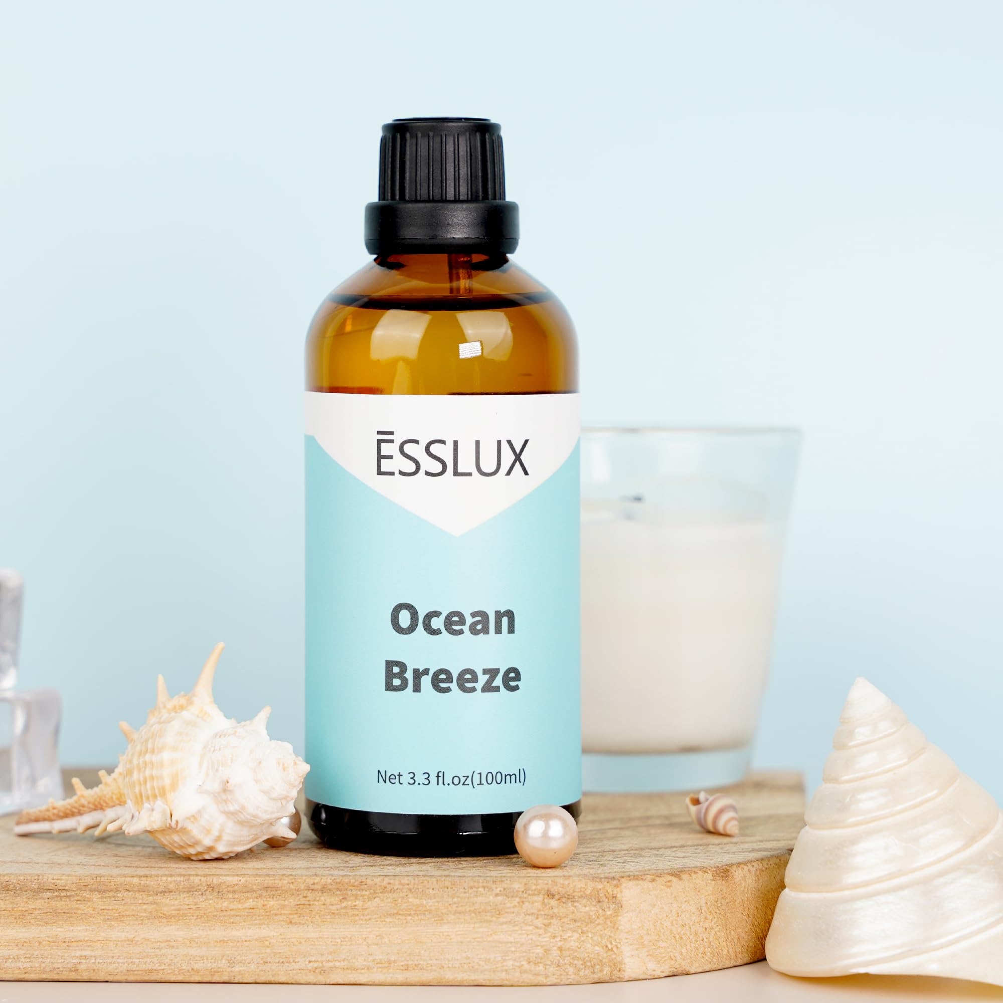 ESSLux Ocean Breeze amber bottle, premium packaging and precise application.