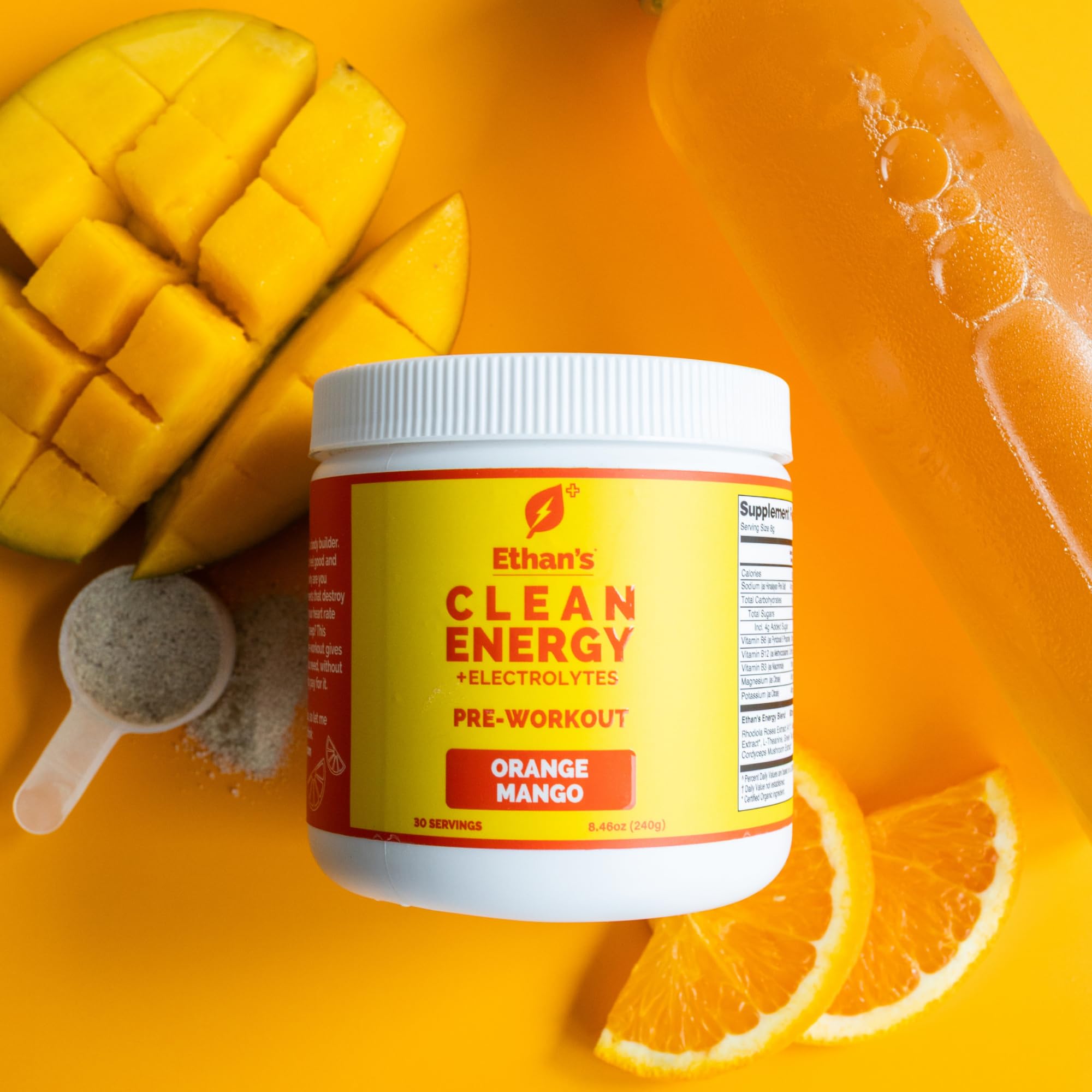 Ethan's Feel Good orange mango powder dissolving in water for steady hydration.