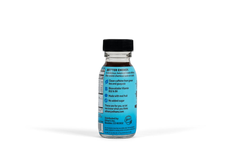 Ethan's Organic Clean Energy Shots with pomegranate blueberry fruits and vibrant color.
