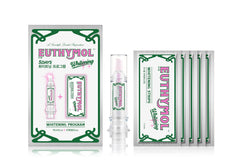 Euthymol booster gel showing pink to white color change for whitening progress
