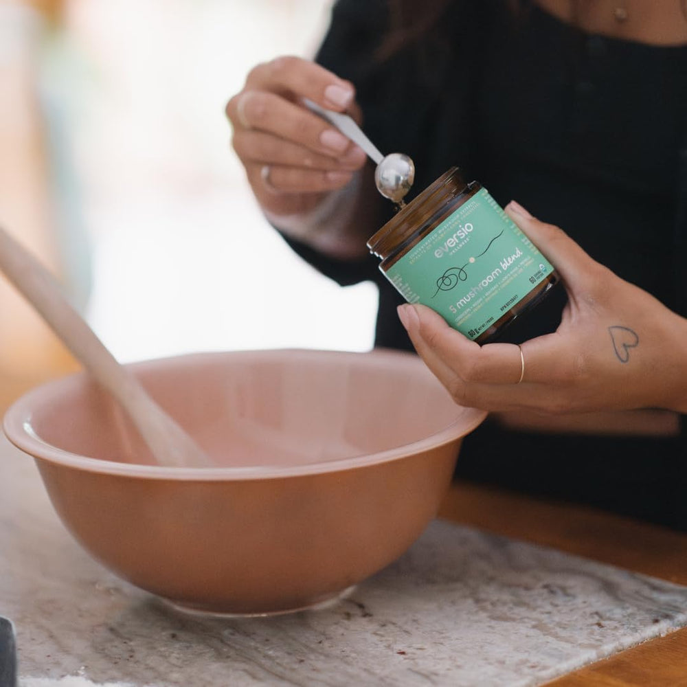 Eversio Wellness daily-use ritual with hot beverage and powder mix