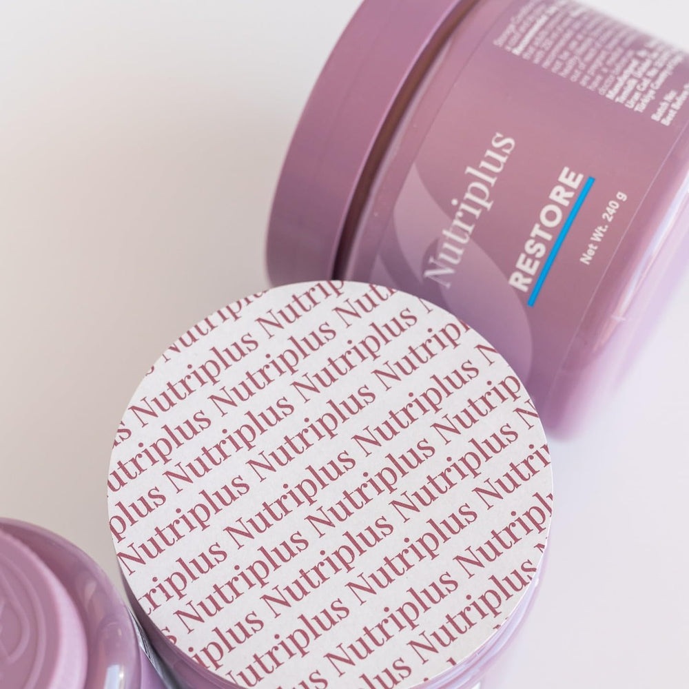 Farmasi Nutriplus Restore mixed in a glass of water for easy consumption.