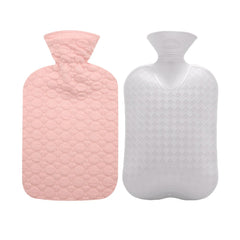 Fashy hot water bottle with blush pink quilted cover delivers cozy warmth.