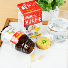 FINE JAPAN Nattokinase lifestyle shot with bottle on desk promoting easy daily use