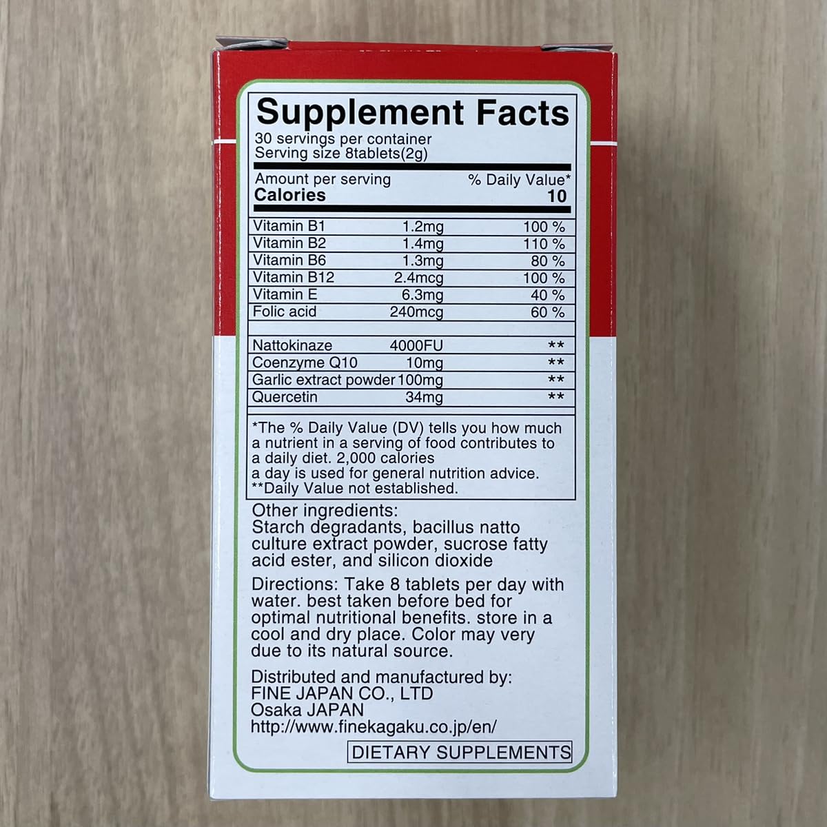 FINE JAPAN Nattokinase tablets close-up showing dosage per day