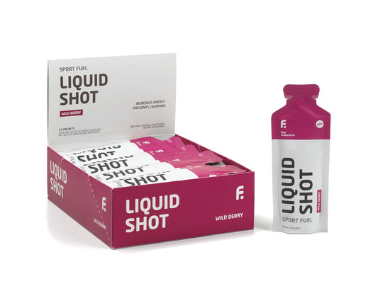 First Endurance Liquid Shot bottle being poured for instant energy during endurance workouts