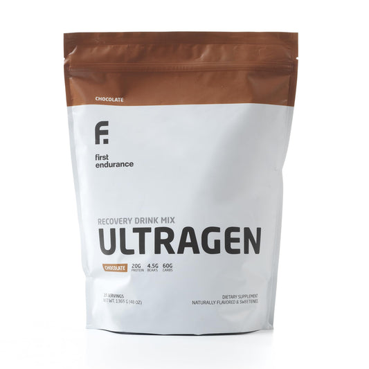 First Endurance Ultragen bottle being poured after a workout for quick recovery.