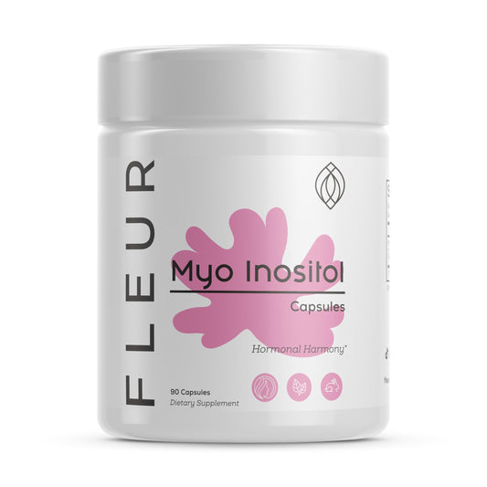 Fleur Myo-Inositol & D-Chiro Inositol capsules on a clean surface, promoting hormone balance.